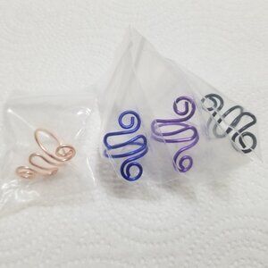 Four crafter's string-holding rings